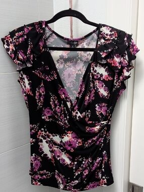 East 5th Black Floral Surplice Top with Purple, White, and Orange Flower Accents